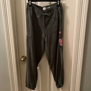 Anthropologie joggers with embroidered flower size S green
